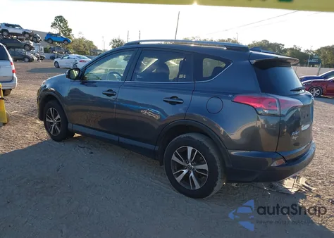 2018 Toyota Rav4 Xle z USA, uszkodzony, nr VIN JTMWFREV7JJ723454